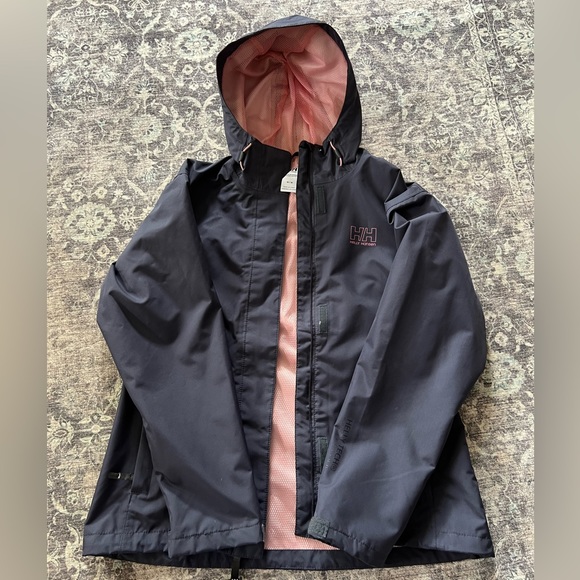 Helly Hansen women’s hooded rain jacket. Navy blue, medium. - Picture 1 of 3